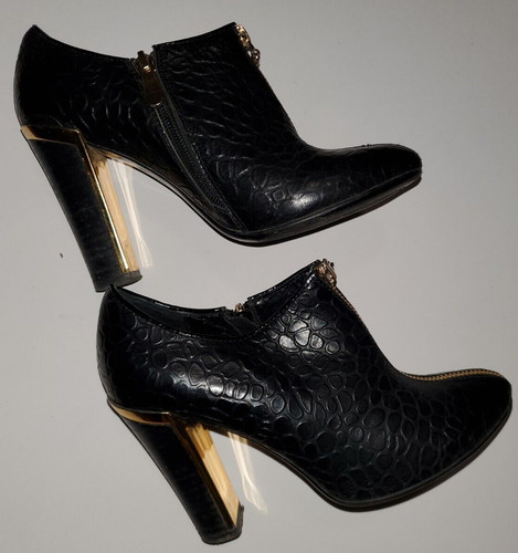 Scarpe con tacco alto